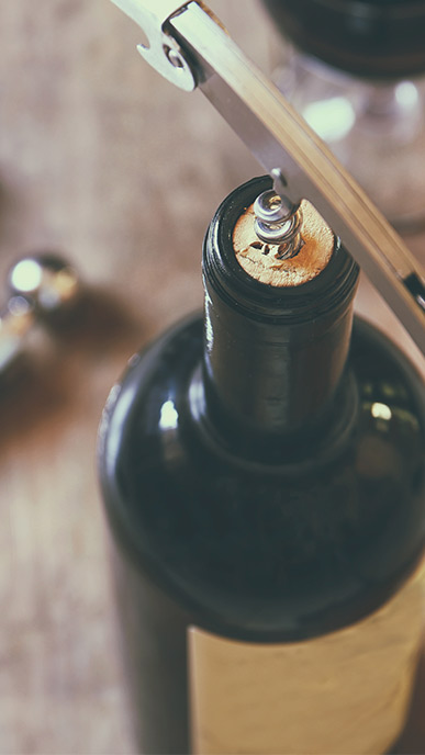 wine bottle being corked