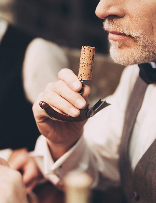 guy sniffing cork